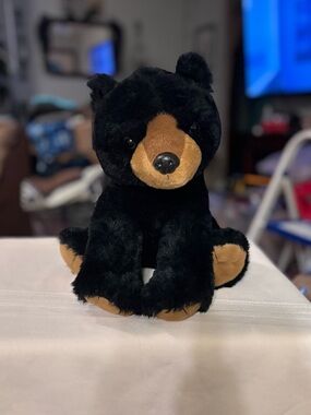 The petting zoo Plush Black and Tan Bear Stuffed Animal
